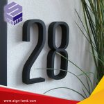 Making room number signs in Muscat